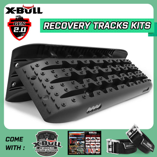 X-BULL KIT1 Recovery track Board Traction Sand trucks strap mounting 4x4 Sand Snow Car BLACK, featuring GEN 2.0 tracks in black with a spiked surface and U-shape design for superior vehicle traction. Made from a durable nylon mixture, the package includes a tow strap, tire deflation kit, and carrying bag. Text reads: 'RECOVERY TRACKS KITS' and 'COME WITH: X-BULL Explore Outdoors.'