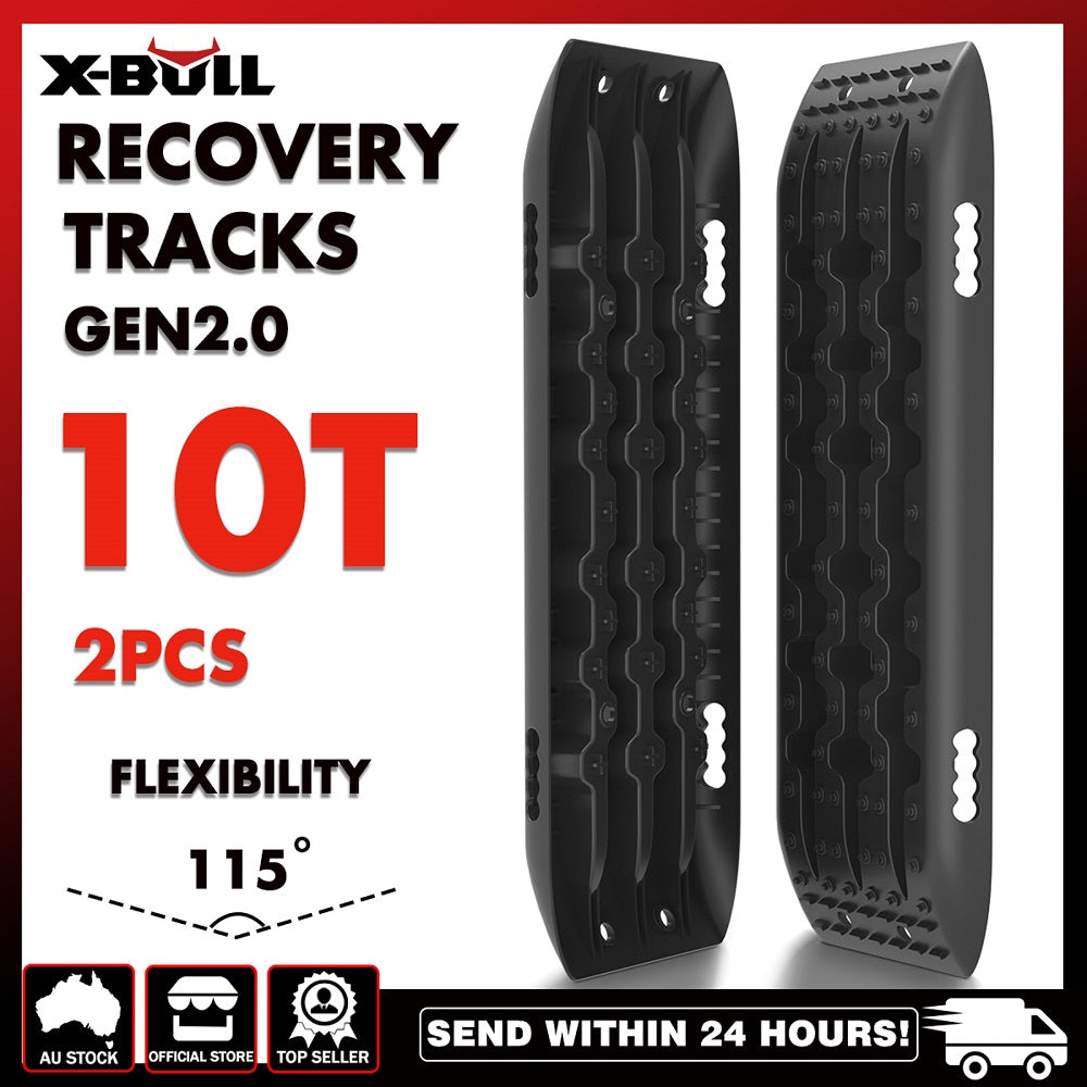 X-BULL KIT1 Recovery track Board Traction Sand trucks strap mounting 4x4 Sand Snow Car BLACK, featuring GEN 2.0 tracks in black with a spiked surface and U-shape design for superior vehicle traction. Made from a durable nylon mixture, the package includes a tow strap, tire deflation kit, and carrying bag. Text reads: 'RECOVERY TRACKS KITS' and 'COME WITH: X-BULL Explore Outdoors.'