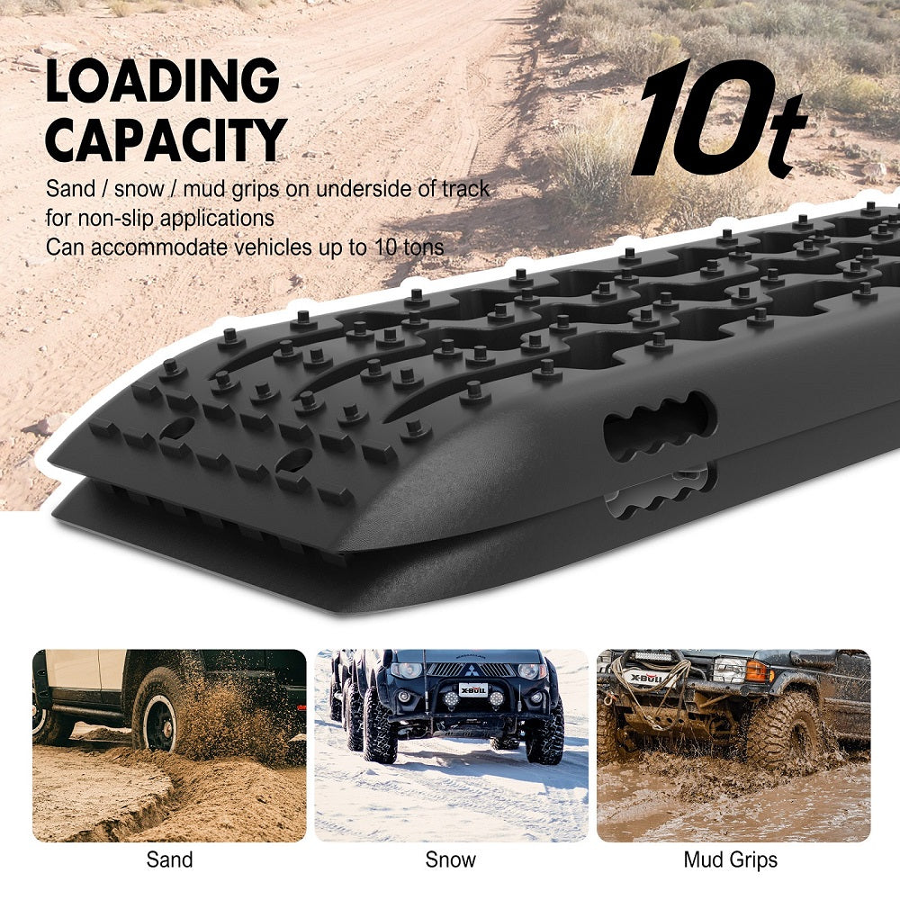 This image shows four X-BULL Recovery Tracks Gen 2.0 10T Sand Mud Snow 2 Pairs Offroad 4WD 4x4 2PC 91CM Black designed for off-road vehicle recovery. The boards feature a rugged, textured surface for enhanced grip and a cruciform design for added strength. Below the boards are three black straps with buckle fasteners, likely for securing the tracks when not in use.