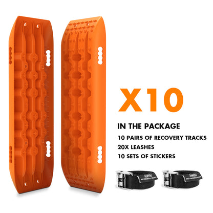 An image showcasing orange recovery tracks with a multifunctional design. The text reads "X-BULL 10 Pairs of Recovery tracks Boards Traction 10T Sand tracks/ Mud /Snow Gen 2.0 IN THE PACKAGE" and lists 10 pairs of recovery tracks made from durable nylon material, 20x leashes, and 10 sets of stickers. Two black straps with buckles are displayed at the bottom.