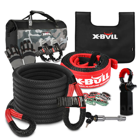 The image shows an X-BULL Recovery Kit Kinetic Recovery Rope With Hitch Receiver 5T Recovery Receiver, featuring a black and red kinetic recovery rope, metal shackles, and a heavy-duty recovery gear bag with a camouflage pattern. Additional items include heavy-duty gloves and other X-BULL branded recovery accessories.