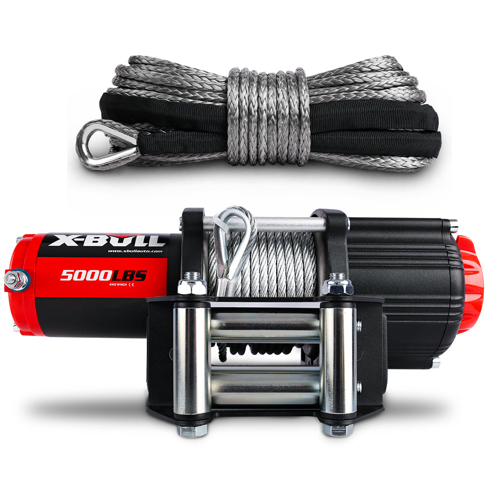 A heavy-duty electric winch with a pulling capacity of 5000 lbs by X-BULL Electric Winch 12V 5000LBS Wireless Steel Cable ATV Boat With 13M Synthetic Rope is shown. The winch features a robust motor with red and black casing, mounted with an all-steel shell and steel roller fairlead. A thick, coiled synthetic rope is positioned above the winch for optimal performance.