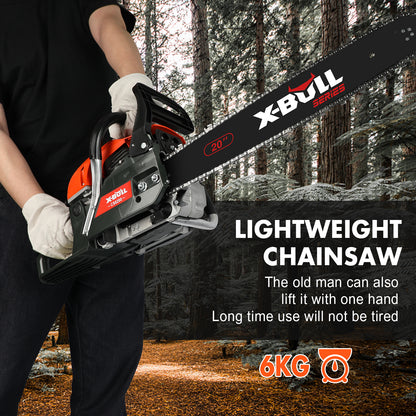 An orange and black X-BULL Chainsaw Petrol Commercial 62cc 20" Bar E-Start Tree Pruning Top Handle, with high-power cutting capabilities and an anti-vibration system. Accessories include safety earmuffs, safety glasses, work gloves, toolkit items, a spare chain, a file, a user manual, and a carrying bag labeled "TOOLKIT." All items are neatly arranged.