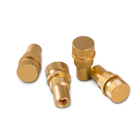 Four X-BULL Tyre Deflators Brass Air Deflator 0-60 PSI Tire Valve Core Tool Automatic, made of 100% solid brass, are shown against a white background. Three deflators are lying on their sides, and one is standing upright. Each deflator has a ribbed texture for grip.