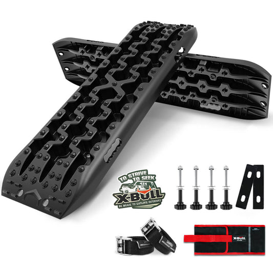 A set of X-BULL Recovery tracks Sand tracks KIT Carry bag mounting pin Sand/Snow/Mud 10T 4WD-black Gen3.0 with the logo in the foreground, showcasing their durable nylon material. Also shown are four metal mounting pins with fasteners, one black storage strap with a metal buckle, a red storage bag, and a pair of mounting brackets featuring a cruciform design.