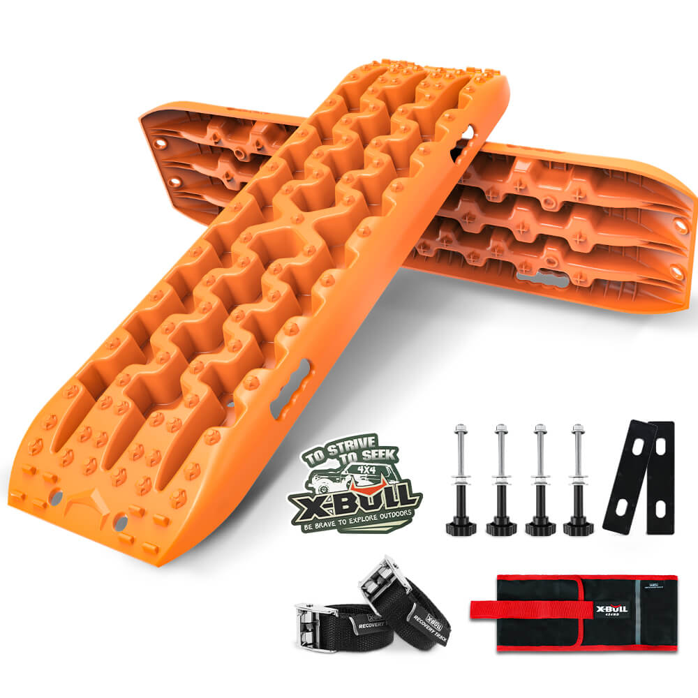 Image of two orange X-BULL Recovery tracks Sand tracks KIT Carry bag mounting pin Sand/Snow/Mud 10T 4WD-Orange Gen3.0, designed to help vehicles get unstuck from mud, sand, or snow. Also shown are mounting hardware, including four bolts, straps, and XBULL leashes in a carrying case. The branding "X BULL" is displayed with a slogan and logo.