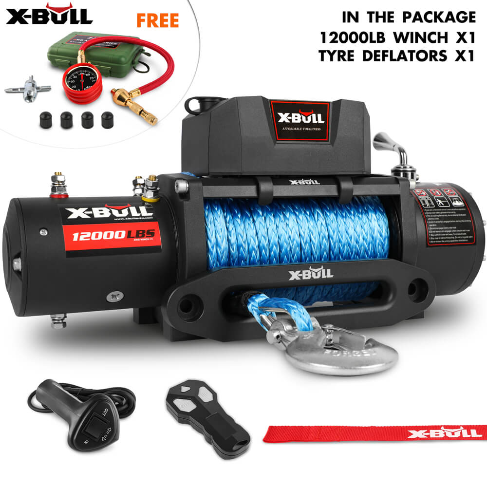 A black X-BULL 12V Electric Winch 12000LBS synthetic rope 4wd Jeep with Tire Deflator is displayed, featuring pure copper motors and a three-stage planetary gear system. Alongside are a red strap, remote control, key fob, tire inflator gauge, and small tools. Text on the image reads "IN THE PACKAGE: 12000LB WINCH X1 TYRE DEFLATORS X1 FREE