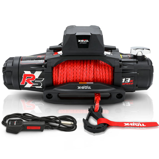 A black X-BULL Electric Winch 13000LBS 12V Synthetic Rope 28M Wireless Offroad 4WD 4x4 with red synthetic rope and a label indicating a 13,000 lbs pulling force is shown. Attached is a handheld remote control with a cord. The winch features a robust design suitable for off-road recovery or towing.