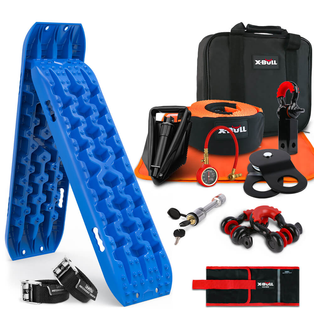 Image of an X-BULL Winch Recovery Kit Recovery Tracks Gen 3.0 Blue Boards Snatch Strap Off Road 4WD featuring blue traction boards, a black air compressor, an orange recovery strap, a black winch damper, a red and black snatch block, D-ring shackles, a tire deflator, a tire gauge, two black tow straps—part of a comprehensive winch accessory kit—and a carrying bag.