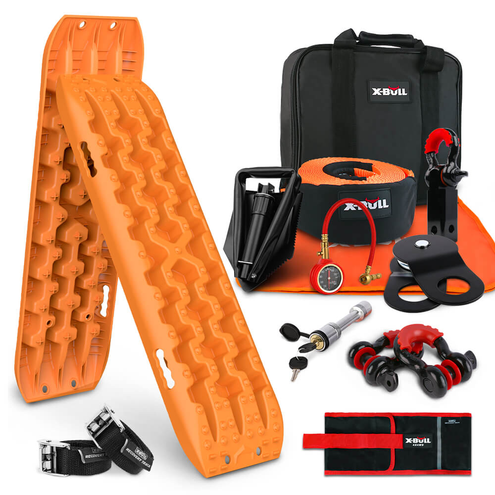 A comprehensive recovery kit, the **X-BULL Winch Recovery Kit Recovery Tracks Gen 3.0 Boards Snatch Strap Off Road 4WD** includes orange traction boards, a carrying bag, a tow strap, a tire deflator, a snatch block, D-shackles, a hand-held air pump, Velcro straps, and a recovery tool roll. Perfect for 4x4 winching adventures and branded X-BULL.