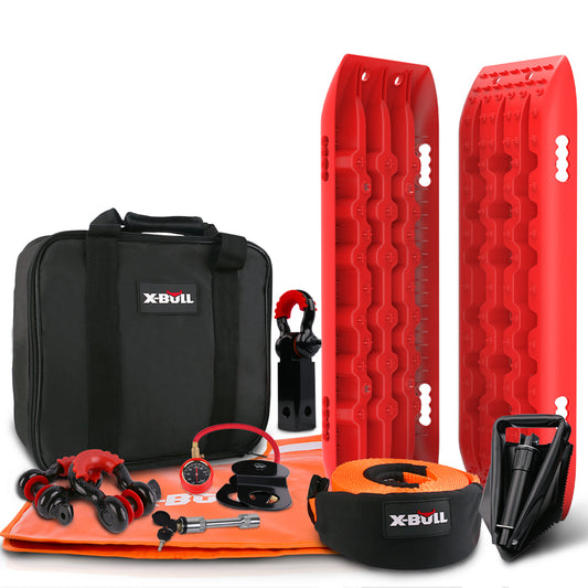 The image shows a set of off-road recovery tools, featuring two red traction boards and a versatile tow strap. It also includes a black and red tire deflator, snatch block, two shackles, gloves, and a black carrying case, all labeled X-BULL 4X4 Recovery Kit Winch Recovery kit With Recovery Tracks Gen2.0 Red.