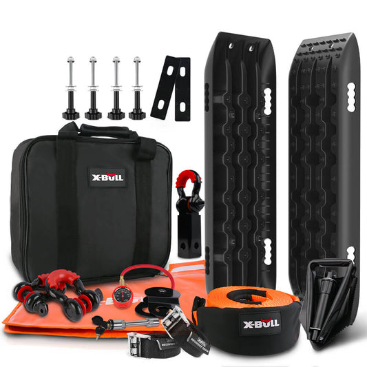 The image shows the **X-BULL Winch Recovery Kit Snatch Strap Off Road 4WD Mounting Pins Recovery Tracks Boards Gen 2.0 Black**, including two black recovery tracks, a carrying bag with the "X-BULL" logo, D-ring shackles, a tow strap, a folding shovel, mounting pins, and various other accessories designed for vehicle recovery.