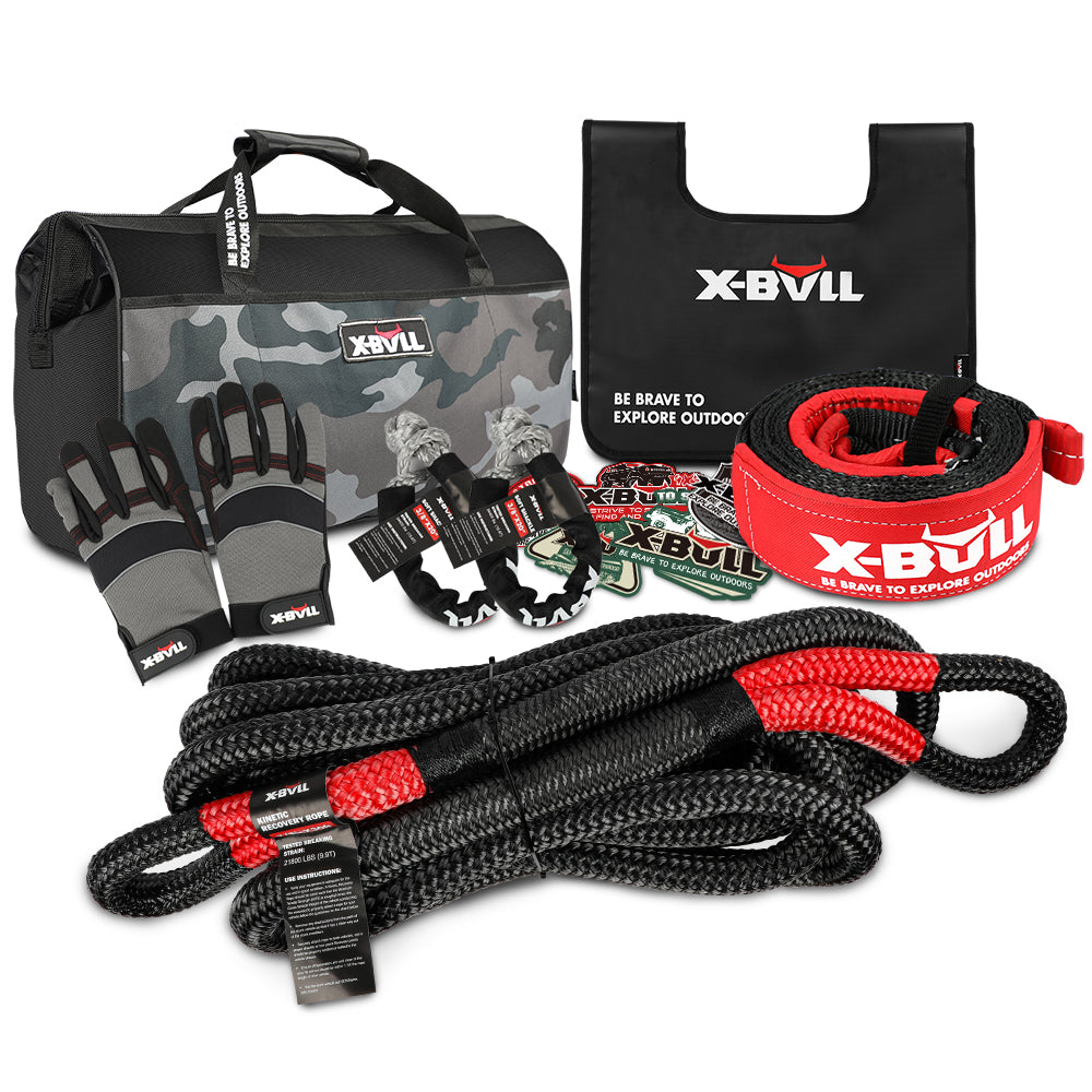 An X-BULL Kinetic Recovery Rope kit Snatch Strap Soft Shackles Hitch receiver 4WD 4X4 includes a camo-patterned carrying bag, a heavy-duty kinetic recovery rope with red reinforced ends, two soft shackles, a hook, a snatch block, black and gray gloves, and various utility straps and accessories.