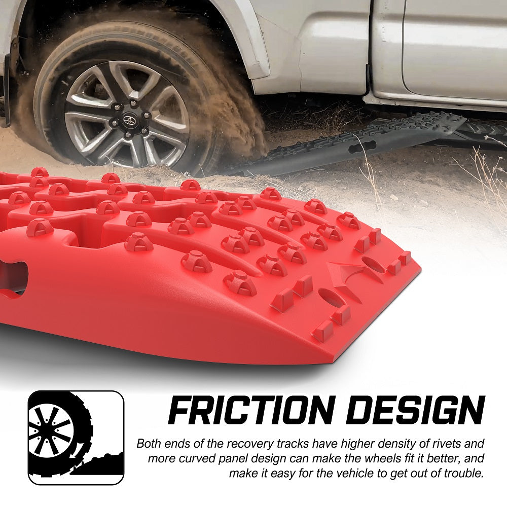 The image shows a set of bright red recovery traction boards branded as "X-BULL Recovery tracks Sand tracks 2pcs 10T Sand / Snow / Mud 4WD Gen 3.0 - Red" in an interlocked position, made from reinforced strong nylon with a 10-ton load capacity. Included are a pair of black straps with metal buckles, an instructional guide featuring images of the product in use, and a red storage bag with a black flap.