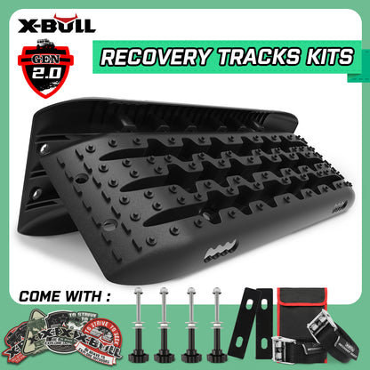 The X-BULL Recovery tracks Sand Trucks Offroad With 4PCS Mounting Pins 4WDGen 2.0 - Black includes rugged, black traction boards made from durable nylon material and mounting accessories for vehicle recovery. Featuring an innovative U-shape design, the package also includes a branded carrying bag, installation hardware, and stickers. Text reads 'Recovery Tracks Kits' and 'Come with.'