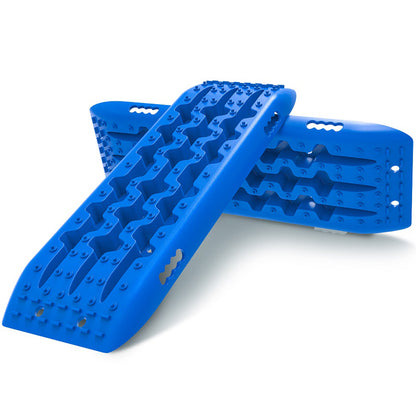 Image of an X-BULL Recovery tracks Sand tracks 2pcs Sand / Snow / Mud 10T 4WD Gen 2.0 - blue, featuring two blue recovery tracks with traction ridges and a u-shape design for optimal grip, all crafted from a durable nylon mixture. The text "RECOVERY TRACKS KITS" is displayed at the top. Below are images of a carrying case, gloves, and strap that come with the kit.