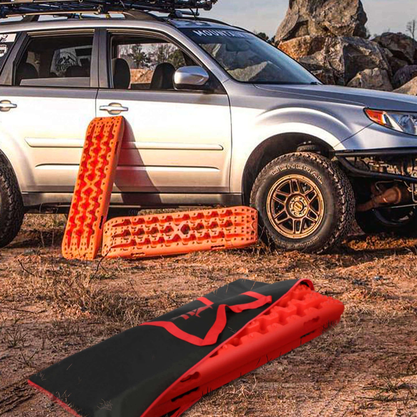 The image shows an X-BULL Recovery tracks Carry Bag 4x4 Extraction Tred Bag Black made of heavy-duty Cordura nylon, featuring red handles and accents. The "X-BULL 4WD" logo is printed on the side in red and white. The design suggests it is perfect for tracks storage and holding equipment related to off-road vehicles.