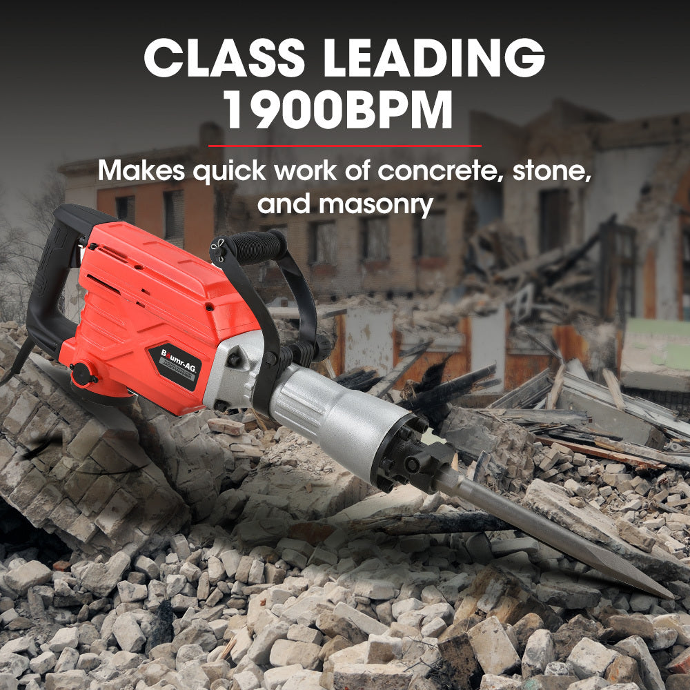 A heavy-duty Baumr-AG 2300W Pro-Grade Electric Demolition Jackhammer, with 3 Bonus Chisels, Carry Case in red and black with a silver metal bit holder is depicted. Resting on a black carrying case, it includes two chisels - one pointy and one flat. This 2300W demolition tool is equipped with a black handle for grip, making it perfect for any commercial grade task.