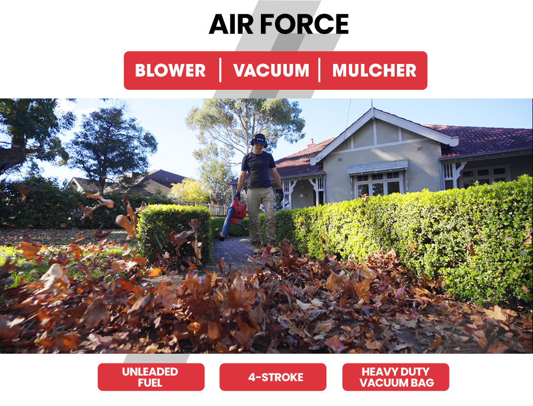 A red "Baumr-AG Petrol Leaf Blower Vacuum 4 Stroke - Vac Garden Commercial Hand Outdoor" with black nozzle and handle features control buttons, a fuel tank, safety labels, and an air vent. This 4-stroke blower boasts a low-emissions engine and stands on a supportive base with a curved design for stability.