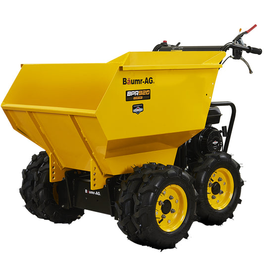 A yellow Baumr-AG 6 Wheel Motorised Wheelbarrow Dumper, Briggs & Stratton CR950 Petrol Engine, 500kg Capacity with four rugged black tires and handlebars. The motorized barrow body is large and angled, designed for heavy-duty tasks, and features a powerful 6.5HP Briggs & Stratton engine at the back.