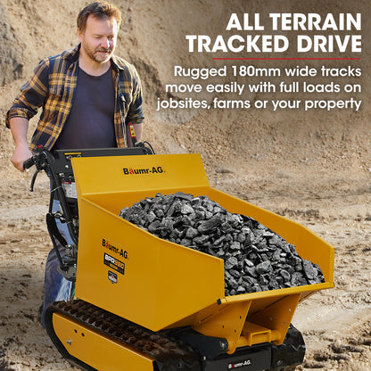 A yellow track dumper with a black and yellow chassis, labeled "Baumr-AG Motorised Tracked Wheelbarrow Dumper, Briggs & Stratton CR950 Petrol Engine, 500kg Capacity," features a spacious cargo bed and is equipped with control handles. The vehicle boasts an ultra-tough build and a powerful motorised wheelbarrow design, making it perfect for traversing various terrains.