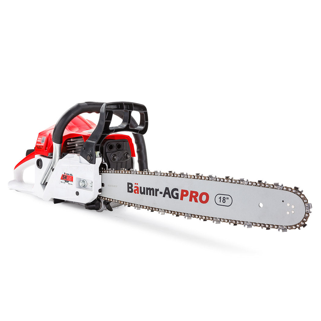 A Tradie's Mate Baumr-AG 45CC Petrol Chainsaw Commercial 18 Bar Chain Saw E-Start Pruning with a 45cc engine and an anti-vibration system. The 18-inch chainsaw features a striking red, black, and white color scheme with the brand and model name prominently displayed on the guide bar, designed for professional use and appearing clean and new.