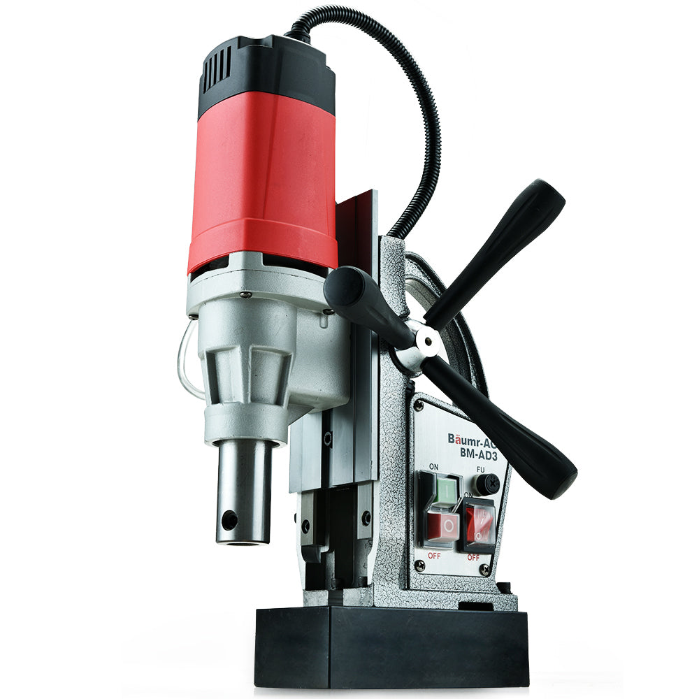 A heavy-duty industrial tool, the Baumr-AG Annular Cutter Magnetic Core Hole Drill Press Machine Metal Drilling features a silver and red motor, black handle grips, and a control panel with on/off switches. Mounted on a black base, it has wires extending from the top and side to connect components—ideal for steel fabrication tasks.