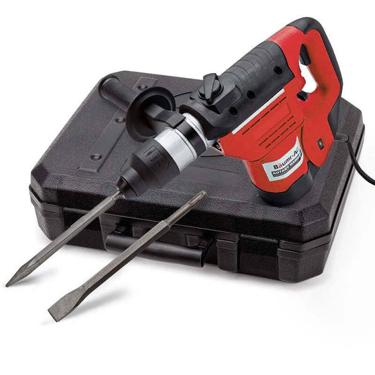 A red and black Baumr-AG 1800W Demolition Rotary Jack Hammer JackHammer Electric Concrete Drill with a side handle is positioned on top of a black carrying case. The drill, equipped with commercial grade motor, has two chisel attachments installed, indicating it's ready for use. The branding and model information are visible on the side of the drill.