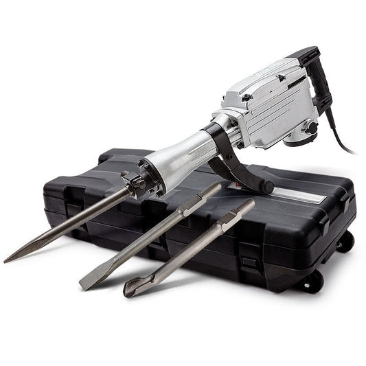 The Baumr-AG 2200W JackHammer Demolition Jack Hammer Demo Chisel Concrete Tool with a silver handle and black motor sits atop a black rolling hard case. Designed for heavy demolition works, it includes two metal chisel attachments placed in front of the jackhammer.