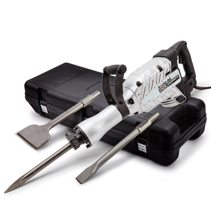 A white and black Baumr-AG 2400W Demolition Jack Hammer Commercial Grade JackHammer Electric Tool is displayed on top of a black storage case. The tool features a handle and two attached bits; one is a pointed chisel and the other is a flat chisel. Ideal for demolition works, this jackhammer boasts a commercial motor. Two additional cases are shown in the background.