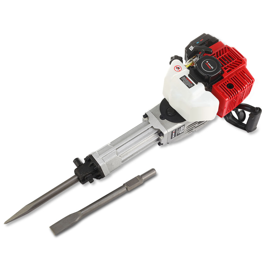 The BAUMR-AG 2 Stroke 52cc Petrol Jackhammer, with 2 Chisels, Carry Bag is a gas-powered demolition tool featuring a red and black motor with a white fuel tank, a long silver metal shaft, and a pointed chisel bit attached. A flat chisel bit is placed beside it on a white background.