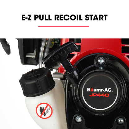 A high impact energy 4-stroke petrol jackhammer with a red and black motor sits on a plain white background. The tool, branded Baumr-AG 4 Stroke Petrol Jackhammer, with 2 Chisels, Carry Bag, has a silver body with a chisel attachment at the end. An additional chisel bit lies next to it.