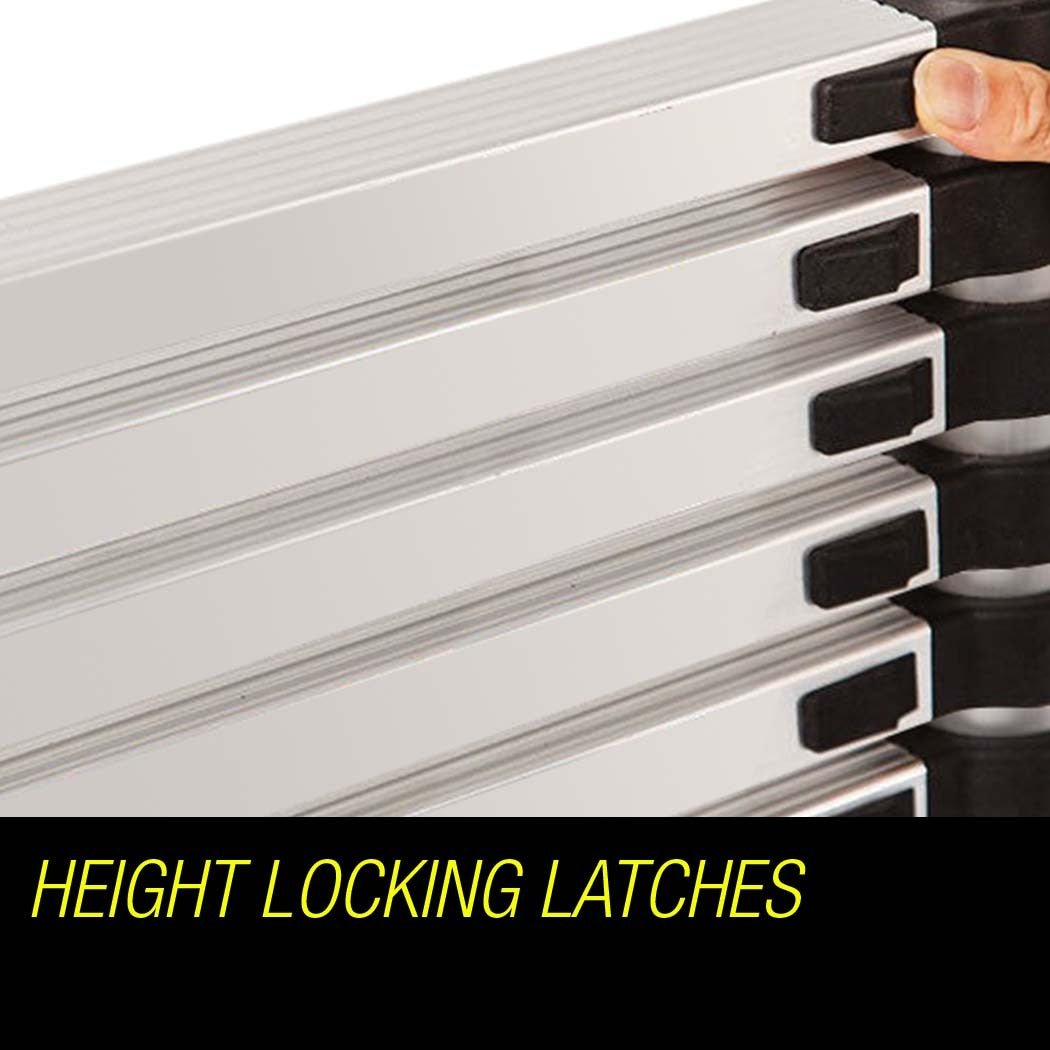 A silver telescopic ladder, known as the Bullet 3.8m Telescopic Aluminium Ladder Alloy Extension Extendable Steps Multi Portable, with a black strap securing the rungs in its compact, collapsed state. This aluminium design features black end caps on the steps and rubberized feet for stability.