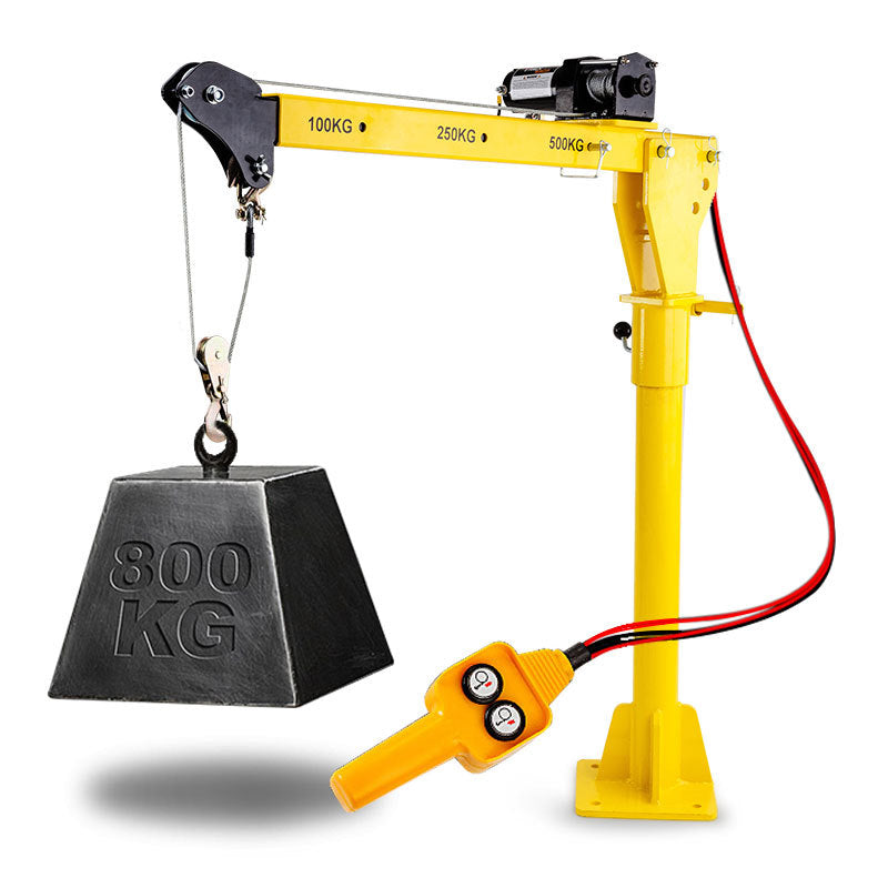 A yellow T-REX 800kg Electric Hoist Winch Crane 12V 360 Degree Engine Car Truck Lift with an attached control handle is lifting a black weight marked "800 KG." The crane, equipped with overload protection function, is designed for lifting objects with a capacity ranging from 100 KG to 500 KG, as labeled on the crane arm.