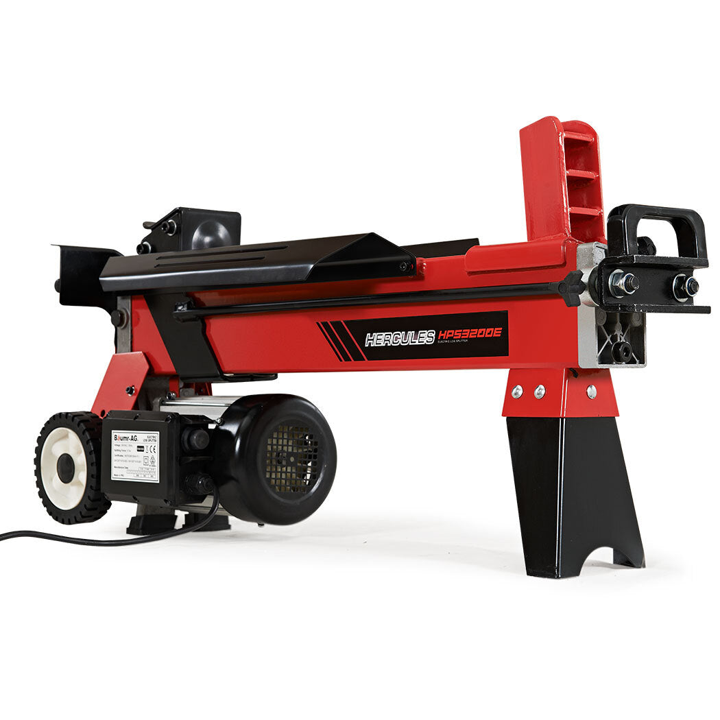 A red and black 9-tonne log splitter from the Baumr-AG 9 Ton Electric Log Splitter 9T Wood Cutter Hydraulic Fire Wood Block Axe Small Machine series features a sturdy metal frame. This electric log splitter has a powerful motor and wheels on one end, with a splitting wedge and safety guard on the other. The model number "HPS2900E" is visible on the side.