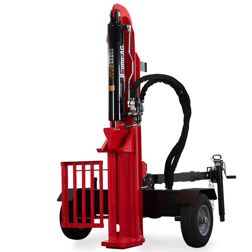 Image of a vertical hydraulic log splitter, the Baumr-AG 40 Tonne Petrol Hydraulic Horizontal and Vertical Towed Wood Log Splitter - HPS700. The machine is primarily red and black with a prominent hydraulic cylinder and a protective cage. Featuring a 40-tonne RAM splitting force, it has two wheels and a hitch for towing. Designed to split logs efficiently for firewood or other uses.