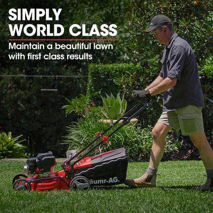 A red and black Baumr-AG Lawn Mower 139CC 17 Petrol Push Lawnmower 4-Stroke Engine Catch with four wheels, a black handle, and a grass collection bag attached at the back. The Baumr-AG 720SX boasts a 139cc engine mounted on its deck, with the brand name "AG" visible on the side.