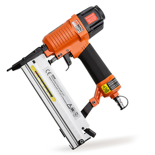 An orange pneumatic nail gun with a black handle, primarily made of metal and plastic, featuring various labels and warning stickers. The model name "UNIMAC 2in1 Air Brad + Staple Finishing Nail Gun Pneumatic Nailer Finish" is visible on top. This air powered nailer, compatible with brad nails and staples, is shown against a white background, slightly tilted to the left.