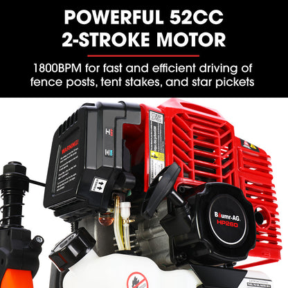 A red and black handheld jackhammer with a white fuel tank, commonly known as the Baumr-AG 52cc 2-Stroke Petrol Post Driver with Carry Case & 2 Drive Sockets. The machine features a cylindrical base for impact, dual handles for operation, and various labels and warnings on its body. This powerful 52cc two-stroke tool is ideal for breaking up concrete or asphalt surfaces.