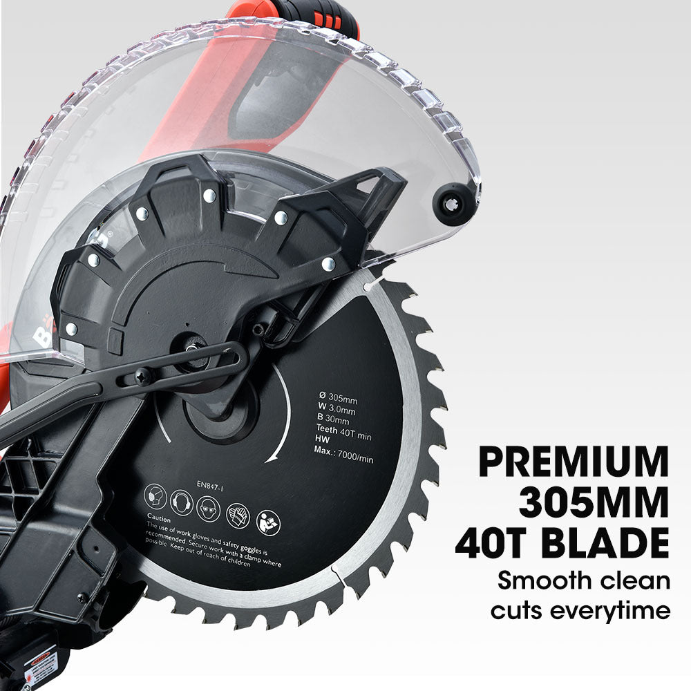 Image of a Tradie's Mate BAUMR-AG 305mm Compound Mitre Saw Dual Bevel Sliding Drop Saws 2200W with a black and red color scheme. The saw, powered by a robust 2200W motor, features a large circular blade with a transparent guard, mounted on a metal base with a miter gauge. The handle, featuring a trigger switch, is ergonomically designed for comfort.