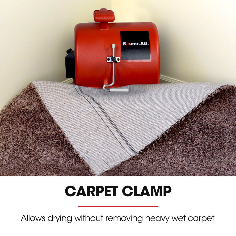 A red industrial carpet dryer branded "Baumr-AG 3-Speed Carpet Dryer Air Mover Blower Fan, 1300CFM, Sealed Copper Motor, Poly Housing" features a large black fan in the center, black ventilation panels at the front, and a carrying handle on top. This robust air blower has cables coiled and attached at the back for easy storage.