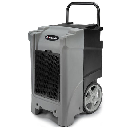 A gray and black industrial portable dehumidifier with a handle and large wheels for easy transport. The unit features a black vented front panel, the brand name "Baumr-AG 90L/day Commercial Air Dehumidifier for Mould, Portable, Stackable, LCD Display, Wheels" on the front, making it ideal for humidity control in industrial water restoration projects.