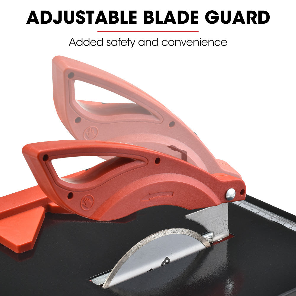 A red and black BAUMR-AG 600W Electric Tile Saw Cutter with 180mm (7") Blade features a wet-cutting system with a powerful 600W motor. The circular blade is partially covered by a protective guard, and the machine sports the "Baumr-AG" logo on the front. It also includes a measurement guide on the top surface for precise cutting.