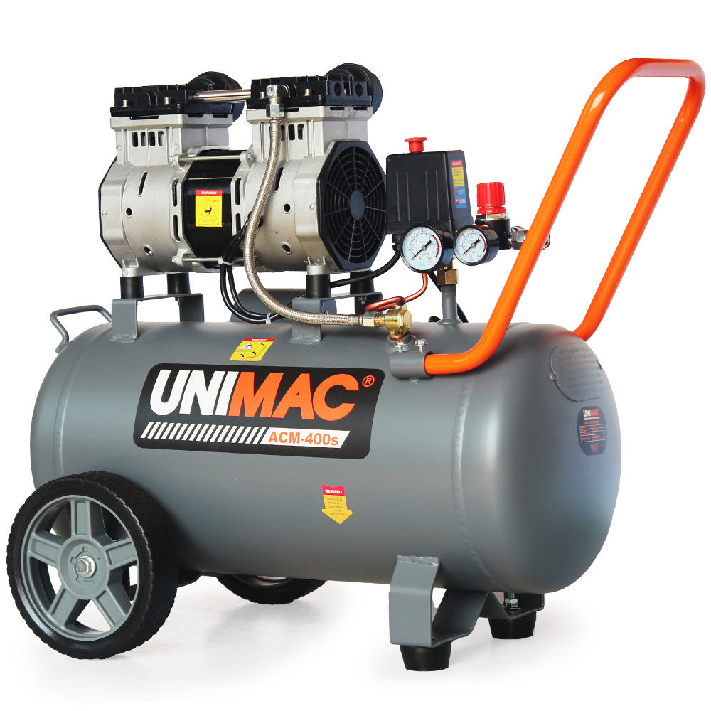 A gray, wheeled UNIMAC 40L 2.0HP Silent Oil-Free Electric Air Compressor, Portable, Twin Nitto Outlets with a red handle and black control panel featuring gauges and knobs. This oil-free air compressor has dual cylindrical components mounted on top and a large tank below, plus two wheels for portability.