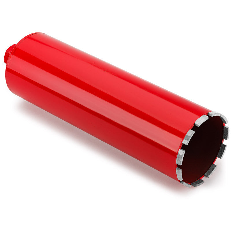 A red cylindrical Baumr-AG Diamond Core Drill Bit 127mm Concrete Wet Dry Tile Stone Brick Marble 1-1/4 UNC with a hollow center and multiple segments along the cutting edge, designed for penetrating tough materials like concrete or stone, is displayed against a white background.