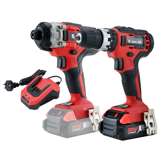 Two red and black cordless power drills, each with a 20V lithium-ion battery attached, are displayed side by side. Next to the drills, a battery charger with an AC power cord is shown. Branded "BAUMR-AG 20V Cordless Drill and Impact Driver Combo Kit w/ SYNC Battery & Charger," these sleek, ergonomic tools are part of the SYNC Drill set for precision work.