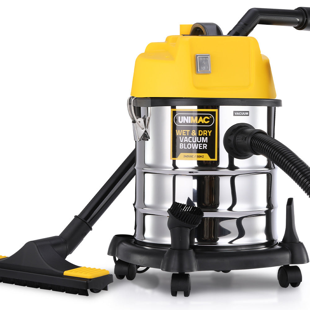 A metal-bodied Unimac 20L 1400W Wet and Dry Vacuum Cleaner, with Blower, for Car, Workshop, Carpet with a bright yellow top and black hose. Powered by a 1400W copper motor, it features HEPA filtration for superior cleaning. The vacuum has wheels for easy mobility and is equipped with a black floor cleaning nozzle. The brand name "UNIMAC" is visible on the front.