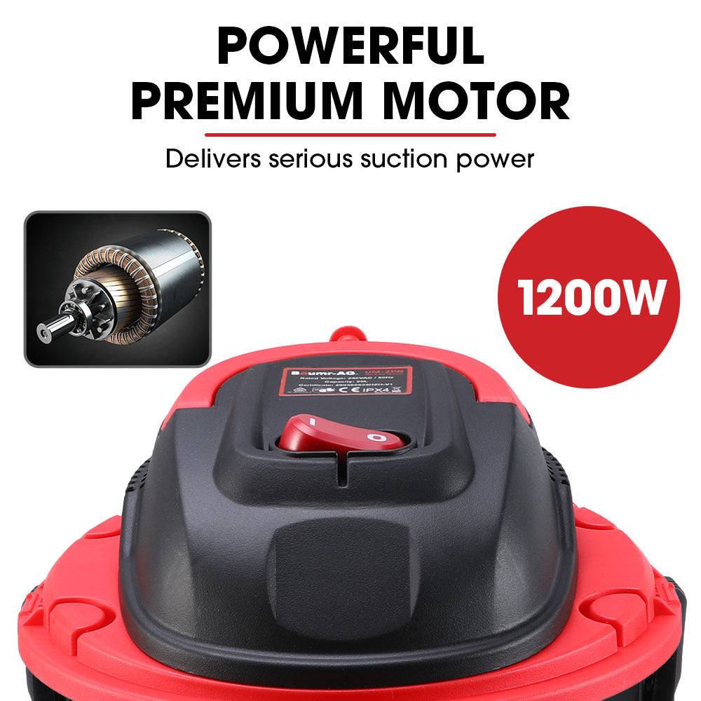 A black and red Baumr-AG 20L 1200W Wet and Dry Vacuum Cleaner, with Blower, for Car, Workshop, Carpet. It features a flexible hose with a wide suction attachment, wheels for easy mobility, and a cylindrical shape with a handle on top. This dual functionality vacuum is perfect for versatile cleaning tasks.