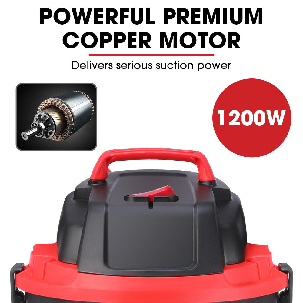 A black and red Baumr-AG 30L 1200W Wet and Dry Vacuum Cleaner, with Blower, for Car, Workshop, Carpet with a cylindrical body, four wheels at the base, and a powerful 1200W motor. It features a large hose extending to the right and a wide brush attachment connected to the bottom of the hose, offering dual functionality for various cleaning tasks.