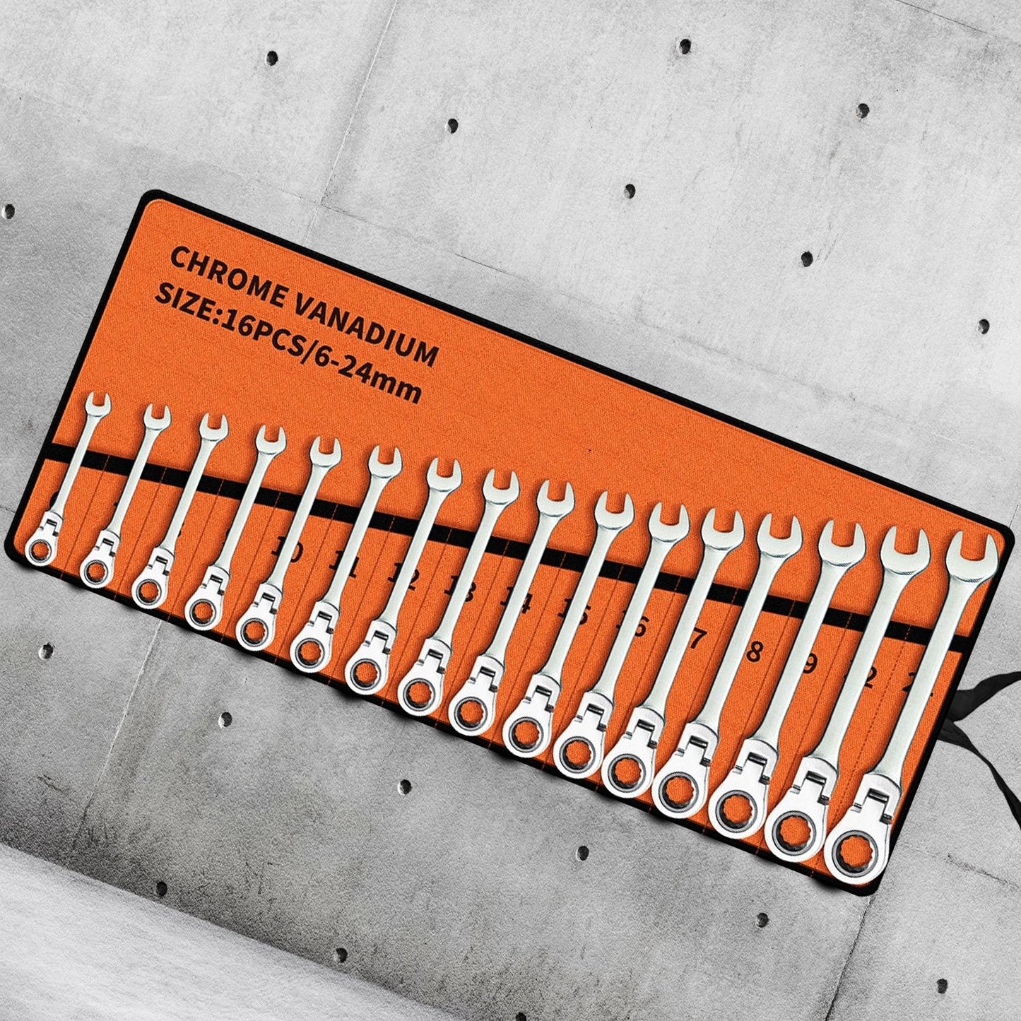 A RYNOMATE 6-24mm Ratchet Spanner Set (16pcs) RNM-RS-100-JL laid out neatly on an orange holder. The metric sizes range from 6mm to 24mm, and each wrench is placed in an individual slot, numbered 1 through 16.